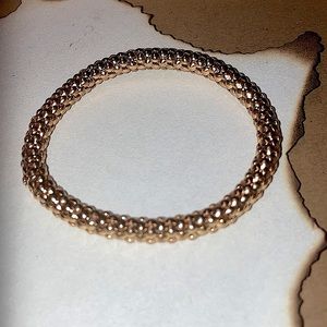 3 fake gold bracelets